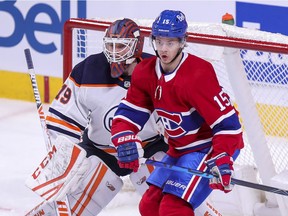 Montreal Canadiens' Jesperi Kotkaniemi sets up in front of Edmonton Oilers goalie Mikko Loskinen during second period in Montreal on May 10, 2021.