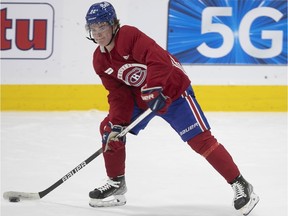 Cole Caufield suffered an upper-body injury during the warmup before Sunday's Red vs. White scrimmage at the Bell Centre.