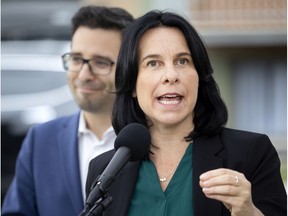 Valérie Plante speaks as Robert Beaudry, councillor in the borough of Ville-Marie in Montreal, on Wednesday, Sept. 22, 2021.