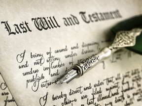 Last Will and Testament document with quill pen and handwriting