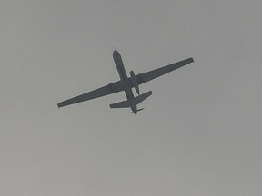 A drone flies over the airport in Kabul on Aug. 31, 2021.