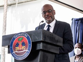 In this file photo, Designated Prime Minister Ariel Henry speaks during a ceremony at La Primature in Port-au-Prince, Haiti, on July 20, 2021.