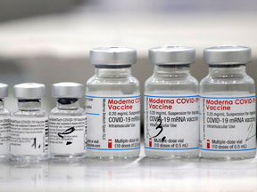 The Pfizer, Moderna and AstraZeneca vaccines are now called Comirnaty, SpikeVax and Vaxzevria, respectively. (David W. Cerny / Reuters)