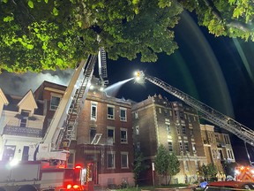 The fire began in a three-storey building on Ste-Catherine St., just east of Abbott St.