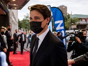 All four party leaders acquitted themselves well in Thursday's French-language TV debate, Robert Libman writes. Above: Liberal Leader Justin Trudeau arrives at the TVA studios in Montreal.