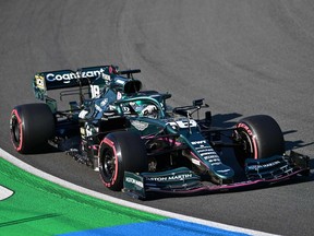 Aston Martin's driver Lance Stroll of Montreal races at the Zandvoort circuit during the qualifying session of the Netherlands' Formula One Grand Prix in Zandvoort on  Saturday, Sept. 4, 2021.