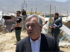 In this file photo taken on June 14, 2017, UN Secretary-General Antonio Guterres speaks with the media at a camp for internally displaced persons on the outskirts of Kabul.