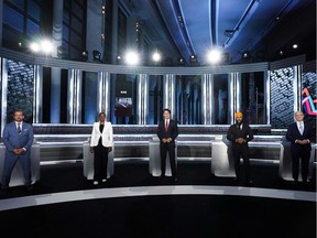 Bloc Québécois Leader Yves-François Blanchet, Green Party Leader Annamie Paul, Liberal Leader Justin Trudeau, NDP Leader Jagmeet Singh, and Conservative Leader Erin O'Toole pose for an official photo before the English-language debate on Sept. 9, 2021.