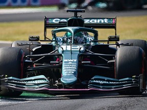 Aston Martin's driver Lance Stroll  of Montreal drives during the second practice session at the Autodromo Nazionale circuit in Monza on Saturday, Sept. 11, 2021, ahead of the Italian Formula One Grand Prix.