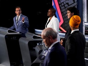 Bloc Québécois Leader Yves-François Blanchet, left, Green Party Leader Annamie Paul, Liberal Leader Justin Trudeau, NDP Leader Jagmeet Singh and Conservative Leader Erin O'Toole take part in the federal English-language leaders' debate in Gatineau, September 9, 2021.