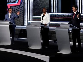 Bloc Québécois Leader Yves-Francois Blanchet, left to right, Green Party Leader Annamie Paul, and Liberal Leader Justin Trudeau, take part in an English-language Leaders debate Thursday night that was a noisy firefight, aimed mainly at Trudeau, Josh Freed writes.