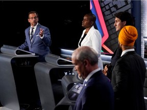 Bloc Québécois Leader Yves-François Blanchet, left, Green Party Leader Annamie Paul, Liberal Leader Justin Trudeau, NDP Leader Jagmeet Singh and Conservative Leader Erin O'Toole take part in the English-language federal election debate in Gatineau on September 9, 2021.