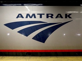 FILE PHOTO: Amtrak train is parked at the platform inside New York's Penn Station, the nation's busiest train hub, July 7, 2017. REUTERS/Brendan McDermid//File Photo