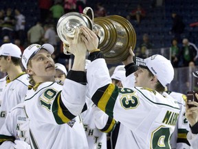 London Knights co-captains Christian Dvorak (left) and Mitch Marner hoist Memorial Cup after winning it in 2016. Dvorak is now the newest member of the Canadiens while Marner is a star with the Toronto Maple Leafs.