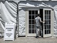 A man enters a monoclonal antibody treatment clinic in Pembroke Pines, Florida.