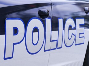 CP-Web. The Montreal Police logo is seen on a police car in Montreal on Wednesday, July 8, 2020. Quebec's police watchdog is investigating a police shooting that left a man dead in Montreal. THE CANADIAN PRESS/Paul Chiasson ORG XMIT: RJB103