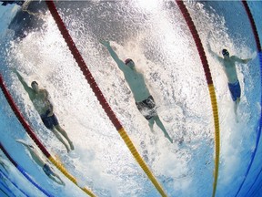 For the Tokyo Olympics, Speedo introduced an innovative suit constructed of three layers of different fabrics, the identity of which are propriety information. From left: Caeleb Dressel (U.S.), Kliment Kolesnikov (Russian Olympic Committee) and Alessandro Miressi (Italy) compete in the men's 100-metre freestyle final.