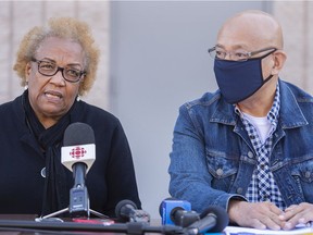 Marie-Mireille Bence, mother of Jean Rene Jr. Olivier, who was shot dead by Repentigny police, attends a news conference on racial profiling by police alongside Fo Niemi of CRARR in Repentigny, Sunday, Sept. 26, 2021.