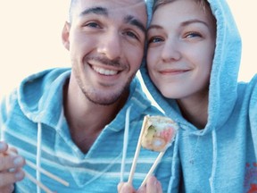 Gabrielle Petito, 22, who was reported missing on September 11, 2021 after traveling with her boyfriend around the country in a van and never returned home, poses for a photo with Brian Laundrie in this undated handout photo.  North Port/Florida Police/Handout via REUTERS  THIS IMAGE HAS BEEN SUPPLIED BY A THIRD PARTY.