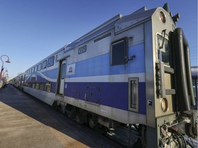 An Exo commuter train manufactured by Bombardier heads west through Beaconsfield, west of Montreal Monday February 17, 2020. "We're seeing a progressive return to public transit, and we have observed that the needs have changed, but we need information about what those changes are," said Daniel Bergeron, the ARTM's chief planning officer.