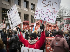 Public health care and social services personal gathered outside Premier François Legault's office in March to protest their lack of a contract.
