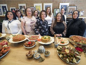 The contributors to a new Syrian cookbook, Les filles fattoush: La cuisine syrienne, une cuisine de coeur. Les Filles Fattoush is a social enterprise that employs Syrian refugees, giving them a chance to break the isolation that can plague immigrants and gain valuable work experience.