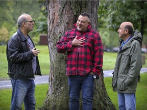Mitch Melnick, left, musician Shane Murphy and Lloyd Fischler, right, at a park in Pointe-St-Charles on Oct. 2, 2021. They are staging an upcoming show at Club Soda.
