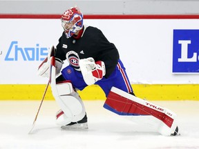 Montreal Canadiens' Carey Price does some exercises on the ice at the Bell Sports Complex in Brossard on Sept. 16, 2021.