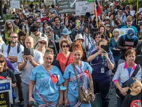 "The protesters would be well served to hear from those who experienced persecution under the Nazi regime," Jack Jedwab writes. Above: A yellow star is displayed, at right, during a recent protest in Montreal.