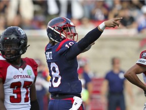 Montreal Alouettes quarterback Matthew Shiltz signals first down after running for a big gain during game-winning drive against the Ottawa Redblacks in Canadian Football League game in Montreal Monday October 11, 2021.