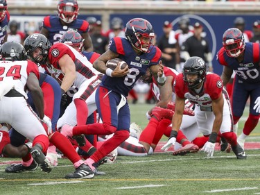 Montreal Alouettes quarterback Vernon Adams Jr. breaks through the line of scrimmage during Canadian Football League game against the Ottawa Redblacks in Montreal Monday October 11, 2021.