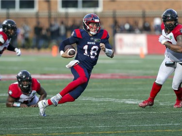 Montreal Alouettes quarterback Marrhew Shiltz runs for a first down during game-winning drive against the Ottawa Redblacks in Canadian Football League game in Montreal Monday October 11, 2021.