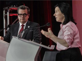 Denis Coderre and Valérie Plante during a debate on the economy in Montreal Oct. 18, 2021.