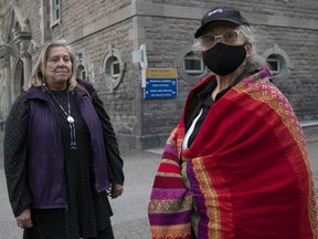 Kawenaa, left, and Kahentinetha are members of the Mohawk Mothers group. The group is demanding a forensic and archeological investigation of the old Royal Victoria Hospital site, which they say contains remains of a precolonial Iroquoian village, and may contain unmarked graves.