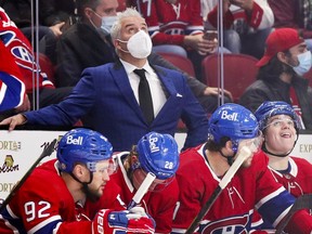 Canadiens head coach Dominique Ducharme looks up at the scoreboard during Tuesday night's 5-0 loss to the San Jose Sharks at the Bell Centre.