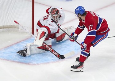 Carolina Hurricanes' Frederik Andersen stops shot by Montreal Canadiens' Josh Anderson during second period at the Bell Centre Thursday, Oct.21, 2021.