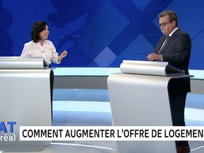 Valérie Plante, left, and Denis Coderre discuss housing in a televised debate on Radio-Canada on Monday, Oct. 25, 2021.