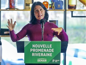 Incumbent mayor Valérie Plante announces the creation of a river walkway that will allow Montrealers to get closer to the St-Lawrence River at a press conference in Montreal on Saturday Oct. 30, 2021.