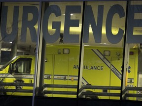MONTREAL, QUE.: DECEMBER 8, 2020 -- Ambulance at the emergency bay of Maisonneuve-Rosemont hospital  on Tuesday December 8, 2020 during the COVID-19 pandemic. (Pierre Obendrauf / MONTREAL GAZETTE) ORG XMIT: 65459 - 6786