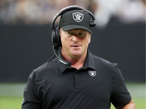 Head coach John Gruden of the Las Vegas Raiders reacts during the first half against the Chicago Bears at Allegiant Stadium on October 10, 2021 in Las Vegas, Nevada.