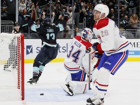 Brandon Tanev of the Seattle Kraken scores on Canadiens' Jake Allen during second period on Oct. 26, 2021, at Climate Pledge Arena in Seattle.