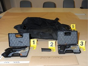 Firearms seized in a storage warehouse in Laval in September 2019, a month before Marie-Josée Viau and Guy Dion were arrested as suspects in the death of Vincenzo and Giuseppe Falduto.