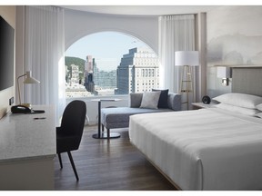 The Montreal Marriott Château Champlain's famous curved alcove windows have panoramic views of downtown, the St. Lawrence River or Mount Royal.