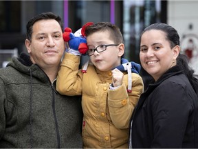 Yonny Peña, Santiago and Yarledy Peña, outside the Montreal Children's Hospital.