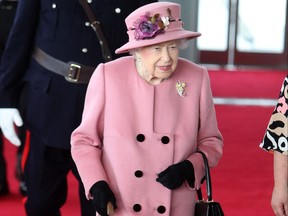 Queen Elizabeth arrives to attend the ceremonial opening of the sixth Senedd, in Cardiff, Wales on Oct. 14, 2021.