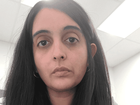 Dr. Neeja Bakshi posted this photo to Twitter September 28, 2021 with the tweet "This is the face of defeat. And anger. We care deeply for our trade. For being able to provide standards of care to our patients. Right now, we can't do that. Because @jkenney puts self-preservation over the health and wellbeing of this province. My colleagues, I see you."