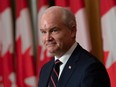 Conservative Leader Erin O'Toole listens to a question from a reporter during a news conference following a caucus meeting in Ottawa on Oct. 5, 2021.