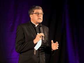 Archbishop of Reims Eric de Moulins-Beaufort speaks on stage of the Saint-Sixte's diocesan house in Reims on September 14, 2021, prior to a performance of the play by Laurent Martinez about pedophilia in the Catholic Church.