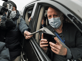 Peter Daszak, a member of the World Health Organization team investigating the origins of the COVID-19 coronavirus, speaks to media upon arriving at the Wuhan Institute of Virology on February 3, 2021.