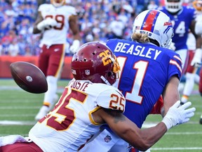 Washington Football Team cornerback Benjamin St-Juste of Montreal breaks up a pass intended for Buffalo Bills wide receiver Cole Beasley.